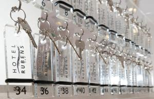 a row of key chains with numbers on them at Hotel Rubens in Rimini
