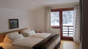 Posteľ alebo postele v izbe v ubytovaní Chalet Berghof