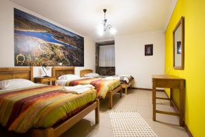 Tempat tidur dalam kamar di Casas do Flor