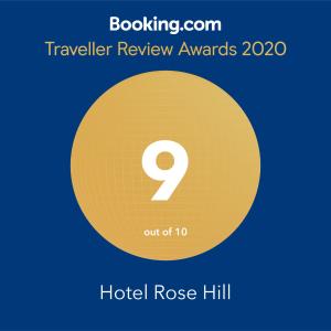 a yellow circle with the number inside it and the text travel review awards at Hotel Rose Hill in Yangon