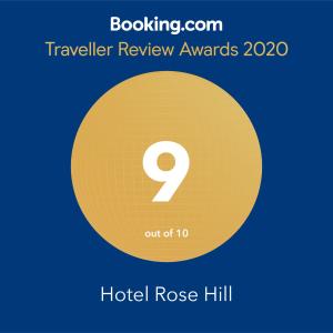 a yellow circle with the number inside it and the text travel review awards at Hotel Rose Hill in Yangon