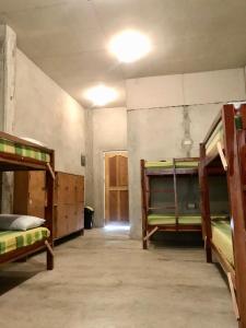 Voodi või voodid majutusasutuse Sharky Hostel Oslob toas