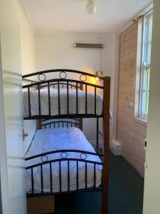Letto o letti in una camera di Sponars Chalet