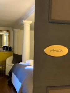 Posteľ alebo postele v izbe v ubytovaní Cavour44 - Palazzo Canossa