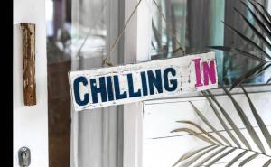 a sign on a door that reads climbing iv at Gravity Eco Boutique Hotel - Adults Only in Uluwatu