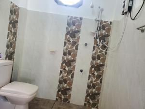 A bathroom at Sigiriya River Side Villa