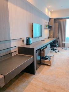 TV a/nebo společenská místnost v ubytování The Howard Plaza Hotel Kaohsiung
