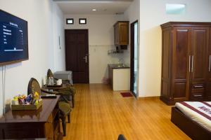 Kjøkken eller kjøkkenkrok på Hoa Phat Hotel & Apartment