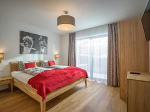Łóżko lub łóżka w pokoju w obiekcie Appartement Strasser