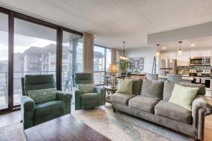 a living room with a couch and two chairs at Sand & Sea: Coastal Range (312) in Seaside