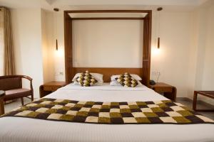 Voodi või voodid majutusasutuse TSG Emerald View Hotel and SPA toas