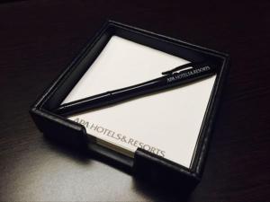 a black and white object sitting on a table at APA Hotel Nambaminami Ebisucho Eki Shinsekai in Osaka