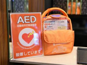 a bag of acid sitting on a table next to a bag ofadobeadobeadobe at APA Hotel Nambaminami Ebisucho Eki Shinsekai in Osaka