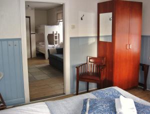 Postel nebo postele na pokoji v ubytování Lugnet Malung Hotell