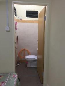 Een badkamer bij WARDAH HOMESTAY