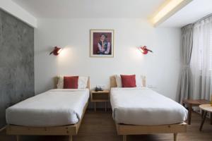 Letto o letti in una camera di Potala Guest House