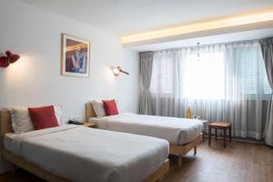 Letto o letti in una camera di Potala Guest House