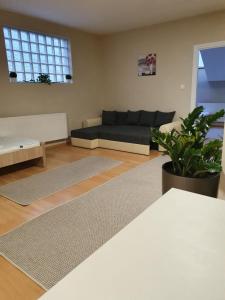 A seating area at Bella Apartman