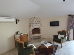 Μια τηλεόραση ή/και κέντρο ψυχαγωγίας στο Exclusive Boutique Hotel +2 φωτογραφίες