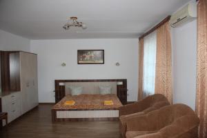 Postel nebo postele na pokoji v ubytování Hotel - restaurant "Lion's heart"