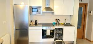 Kuchyňa alebo kuchynka v ubytovaní VIVIENDA T. J.S.E