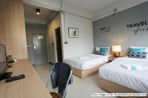 Postel nebo postele na pokoji v ubytování Rajthani Hotel - SHA Certified