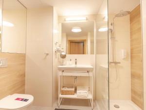 Kúpeľňa v ubytovaní VacationClub – Seaside Apartament 410