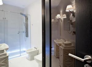 Kúpeľňa v ubytovaní Hotel Betmanowska Main Square Residence Adults Only