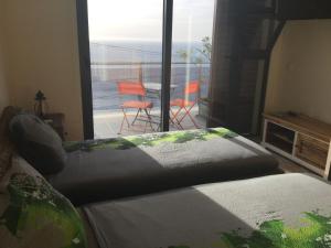 Postel nebo postele na pokoji v ubytování Guesthouse-TheView