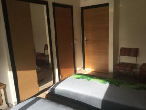 Postel nebo postele na pokoji v ubytování Guesthouse-TheView