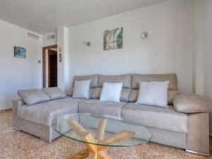 a living room with a couch and a glass table at Apartment Don Pepe-5 by Interhome in Balcon del Mar