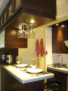A kitchen or kitchenette at Amg Apartments