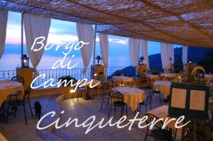 Restoranas ar kita vieta pavalgyti apgyvendinimo įstaigoje Il Borgo Di Campi