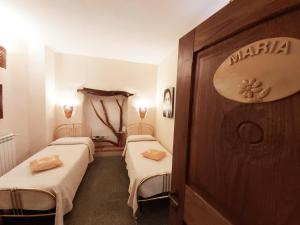 Postel nebo postele na pokoji v ubytování Al Vecchio Corso B&B
