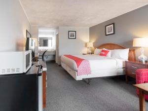 Postel nebo postele na pokoji v ubytování OYO Hotel Jennings I-10