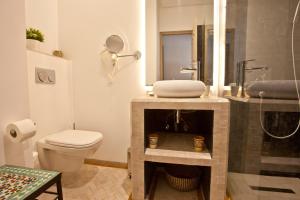 Koupelna v ubytování Amani Hotel Suites & Spa