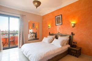 Postel nebo postele na pokoji v ubytování Amani Hotel Suites & Spa
