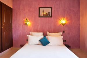 Postel nebo postele na pokoji v ubytování Amani Hotel Suites & Spa