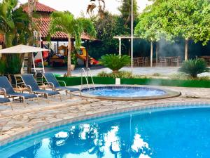 Bazén v ubytování Pousada das Aguas nebo v jeho okolí
