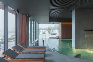 Bazén v ubytování Vilnius Grand Resort nebo v jeho okolí