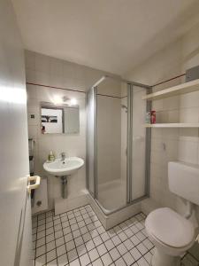 Koupelna v ubytování Beautiful City Apartment für bis 4 Personen
