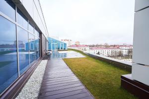 a walkway on the side of a building at Sun City Hotel in Solnechnogorsk