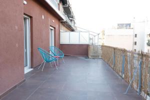 A balcony or terrace at So Athens - Stylish 2 bedroom flat