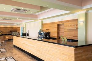 A kitchen or kitchenette at Mitsis Family Village
