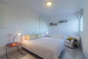 Ein Bett oder Betten in einem Zimmer der Unterkunft Villa Casiopea
