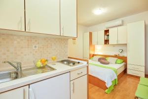 Kuchyň nebo kuchyňský kout v ubytování Apartments Zelic Tucepi