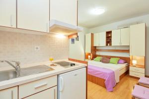 Kuchyň nebo kuchyňský kout v ubytování Apartments Zelic Tucepi