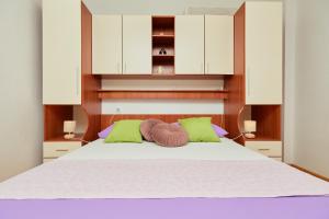Postel nebo postele na pokoji v ubytování Apartments Zelic Tucepi