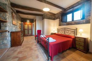 Ένα ή περισσότερα κρεβάτια σε δωμάτιο στο Pie' d'Ulivo
