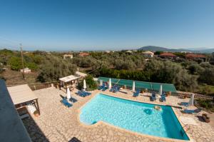 a villa with a pool and a view at Ithaki Holidays in Lefkada